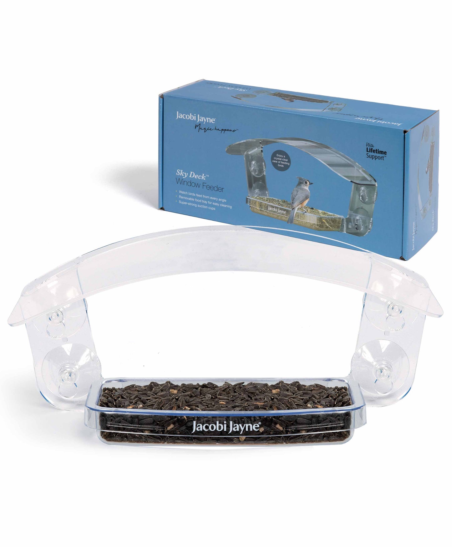 Skydeck Window Feeder filled with black sunflower seeds, in front of gift box. The feeder features a rain resistant weather cover, drainage holes, super strong suction cups.