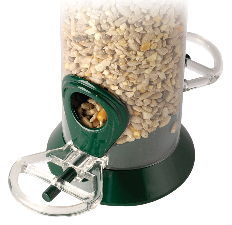 Clear perch rings on a Droll Yankee bird seed feeder port.